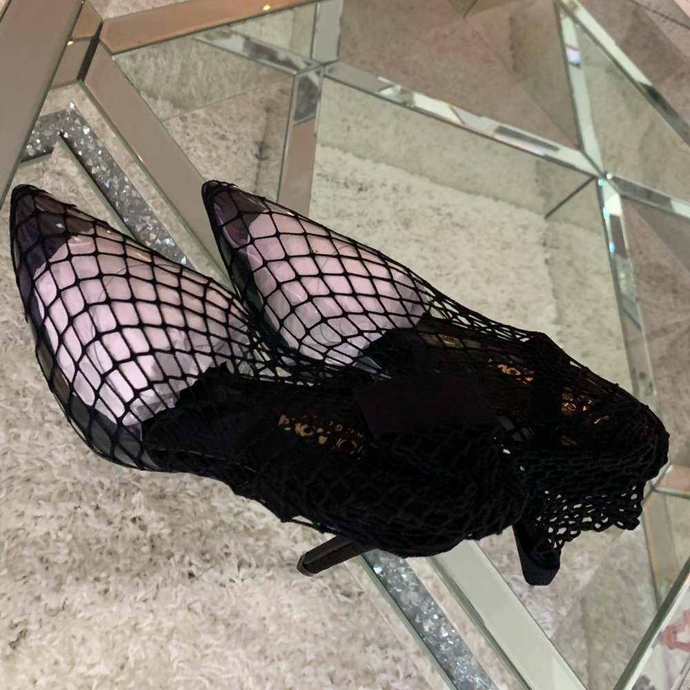 Highly Satisfied Pump Never Worn